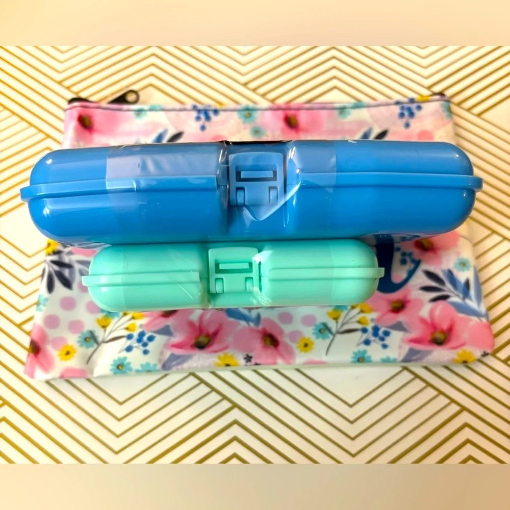 Two Small size cosmetic cases and zipper bag